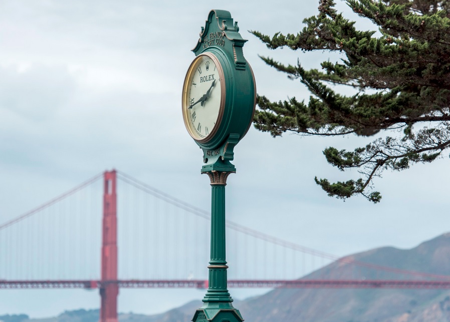 Rolex clock at the St. Francis Yacht Club with the Golden Gate Bridge in the bac