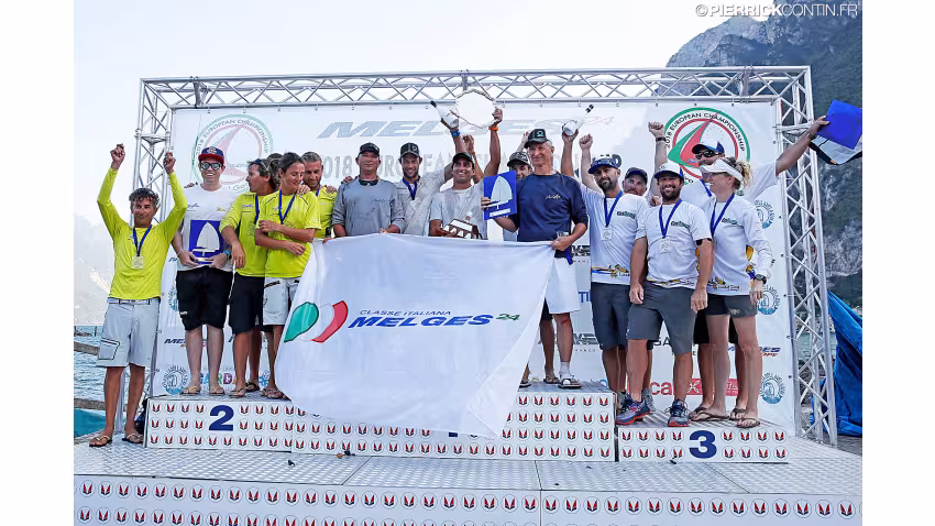 Melges 24 European Championship 2018 podium - 1st Maidollis ITA854 of Gian Luca Perego with Carlo Fracassoli helming; 2nd Caipirinha Jr ITA633 with Matteo Ivaldi at the helm; 3rd Lucky Dog / Gill Race Team USA749 with Travis Weisleder at the helm