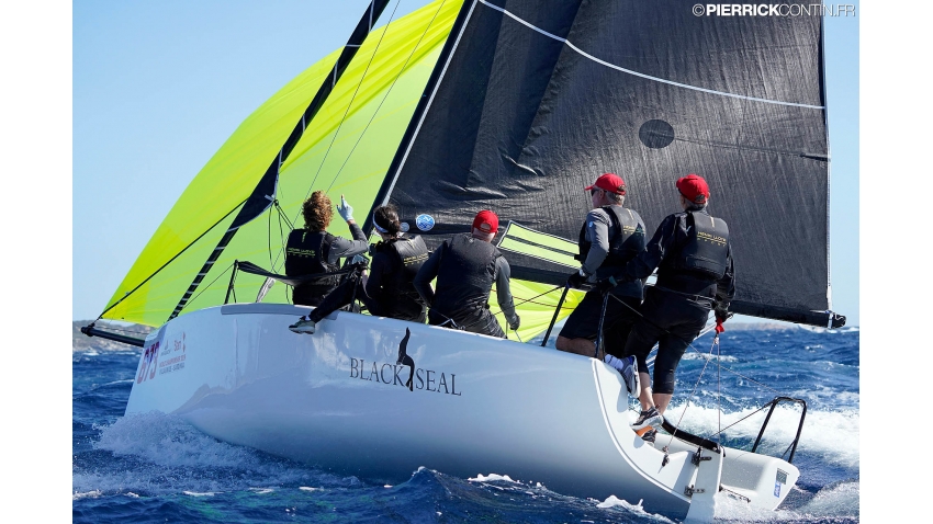 Richard Thompson and his Black Seal with Nigel Young, Stefano Cherin, Michael Claxton and Catherine Alton  - 2019 Melges 24 World Championship - Villasimius, Sardinia, Italy