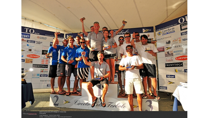 Storm Capital Sail Racing NOR751, Lorenzo Gemini's SIV Arborea, Augusto Poropat's Marrakesh Expres - 2012 Melges 24 World Championship Corinthian division podium - Torbole, Italy