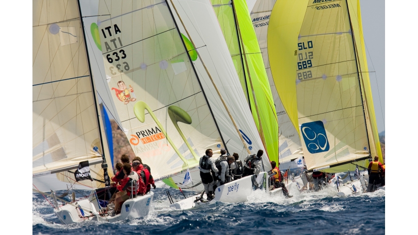 Gabrio Zandona helming for Giovanni Maspero on ITA-777 Joe Fly at the 2008 Volvo Melges 24 World Championship in Porto Cervo, Italy