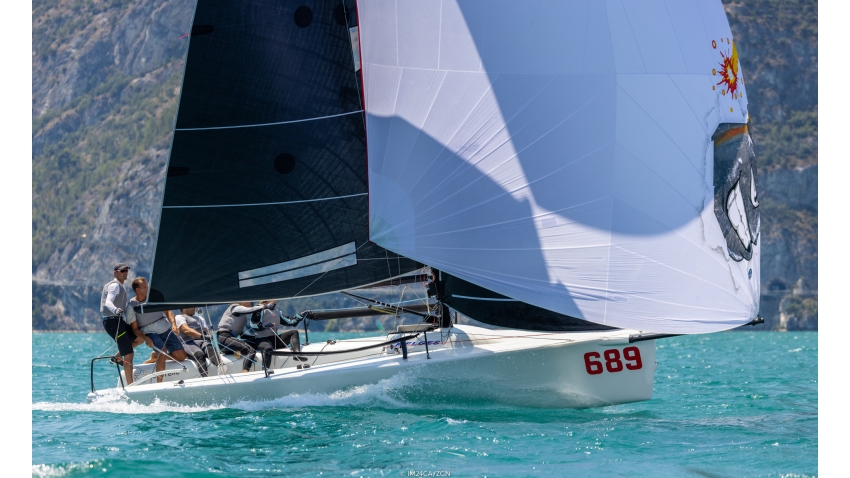 Michele Paoletti on Strambapapà, today 1-1-2-3, took the lead of the pack on Day 1 of the Melges 24 European Sailing Series 2022 event 4 in Riva del Garda, Italy. 