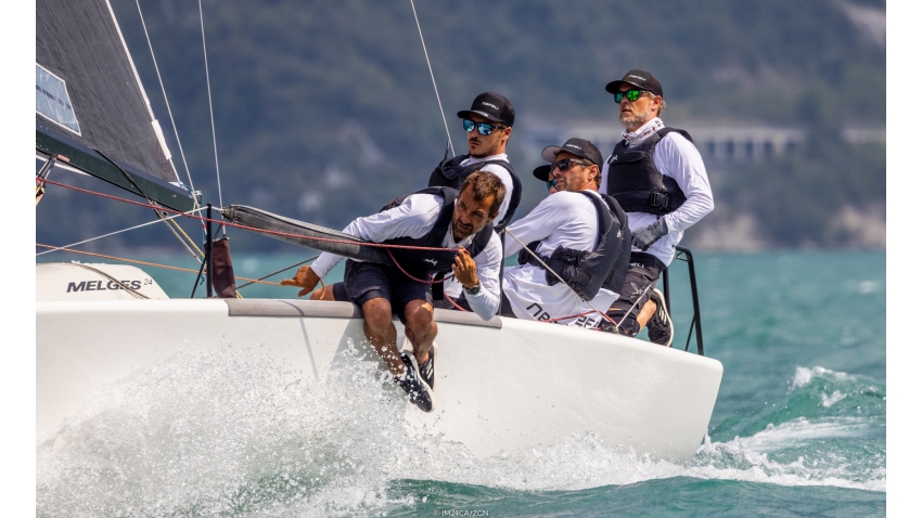 Nefeli GER673 of Peter Karrie with Niccolo Bianchi calling the tactics is on the third position after Day 2 of the Melges 24 European Sailing Series 2022 event 4 in Riva del Garda, Italy.