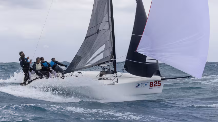 War Canoe USA825 of Michael Goldfarb surfing the waves at the Melges 24 World Championship 2022 in Fort Lauderdale, USA