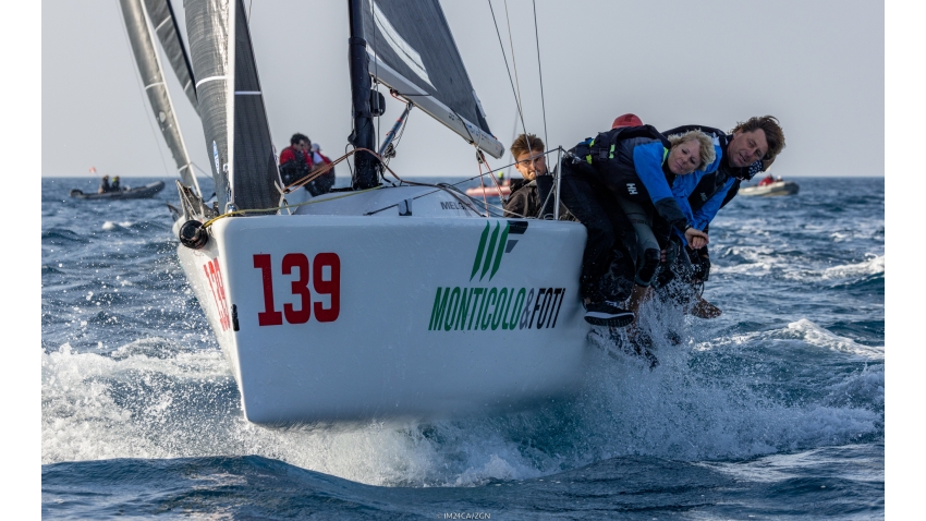 AleAli EUROCART ITA139 of Barbara Bomben helmed by Gianfranco Noé with Dean Bassi, Francesco Crichiutti, Federico Borghi on Day Four of the Melges 24 European Championship 2022 in Genoa