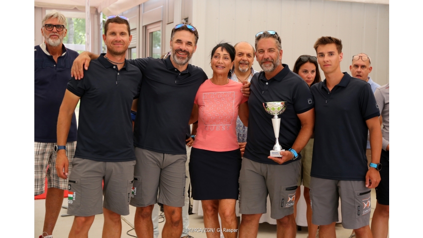 Corinthian division winner in Monfalcone: Akos Csolto's Chinook HUN with Balazs Tomai, Botond Werores, Oliver Demjen and Anna Maria Cisint, the former mayor of Monfalcone and current member of European Parliament - 2025 Melges 24 European Sailing Series - 2025 Trofeo Gaudi - Monfalcone, Italy