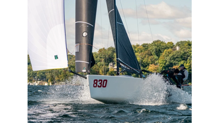 Chelsea Simms, one of five women set to helm a Melges 24 at the Worlds, sends Straight Arrow downwind with full sails, flying spray and plenty of breeze. 