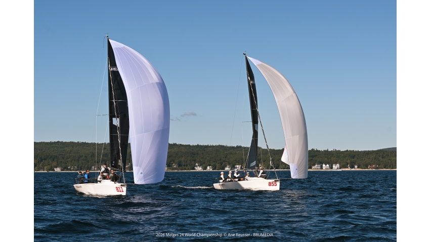 Looper crosses the finish line ahead of Troublemaker / Gill Race Team, sealing the final-day comeback that earned Duane Yoslov and his crew the 2026 Melges 24 Corinthian World Championship title. - Melges 24 World Championship 2026 in Harbor Springs