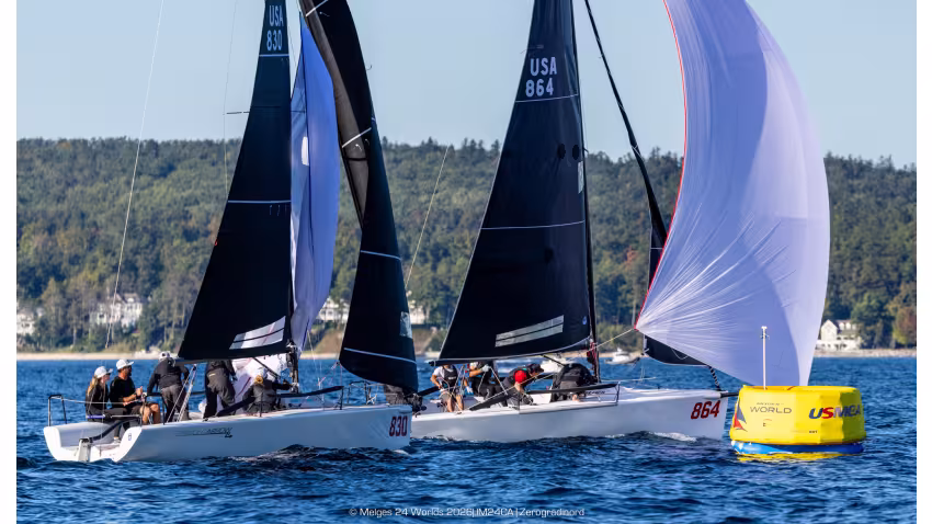 Shiitake (USA864) by Peter Duncan and Straightarrow (USA830) by Chelsea Simms on the Race 10 finish line - Day Four of the Melges 24 World Championship 2026 in Harbor Springs 