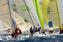 Gabrio Zandona helming for Giovanni Maspero on ITA-777 Joe Fly at the 2008 Volvo Melges 24 World Championship in Porto Cervo, Italy