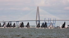 Charleston Race Week - The Melges 24 fleet beats upwind with the Arthur Ravenel Jr. Bridge in the background 