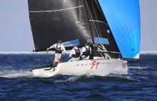 Defending Melges 24 U.S. National Champion Brian Porter sailing Full Throttle reveled in the fresh breeze on Pensacola Bay to take the overall lead.