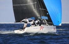 Defending Melges 24 U.S. National Champion Brian Porter sailing Full Throttle reveled in the fresh breeze on Pensacola Bay to take the overall lead.