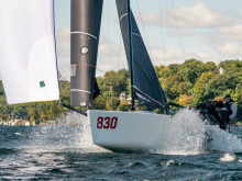 Chelsea Simms, one of five women set to helm a Melges 24 at the Worlds, sends Straight Arrow downwind with full sails, flying spray and plenty of breeze. 