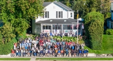Melges 24 Worlds team photo in front of the Little Traverse Yacht Club at the Melges 24 World Championship 2026 - Harbor Springs, MI, USA