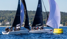Shiitake (USA864) by Peter Duncan and Straightarrow (USA830) by Chelsea Simms on the Race 10 finish line - Day Four of the Melges 24 World Championship 2026 in Harbor Springs 