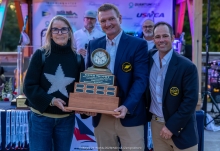 Sandy Askew by Flying Jenny (USA 869) receives the Meier Trophy for the highest-finishing female helmsperson from Little Traverse Yacht Club Commodore Dunne Saal and Vice Commodore George Peet after guiding Flying Jenny to tenth overall - Melges 24 World Championship 2026 - Harbor Springs, MI, USA 